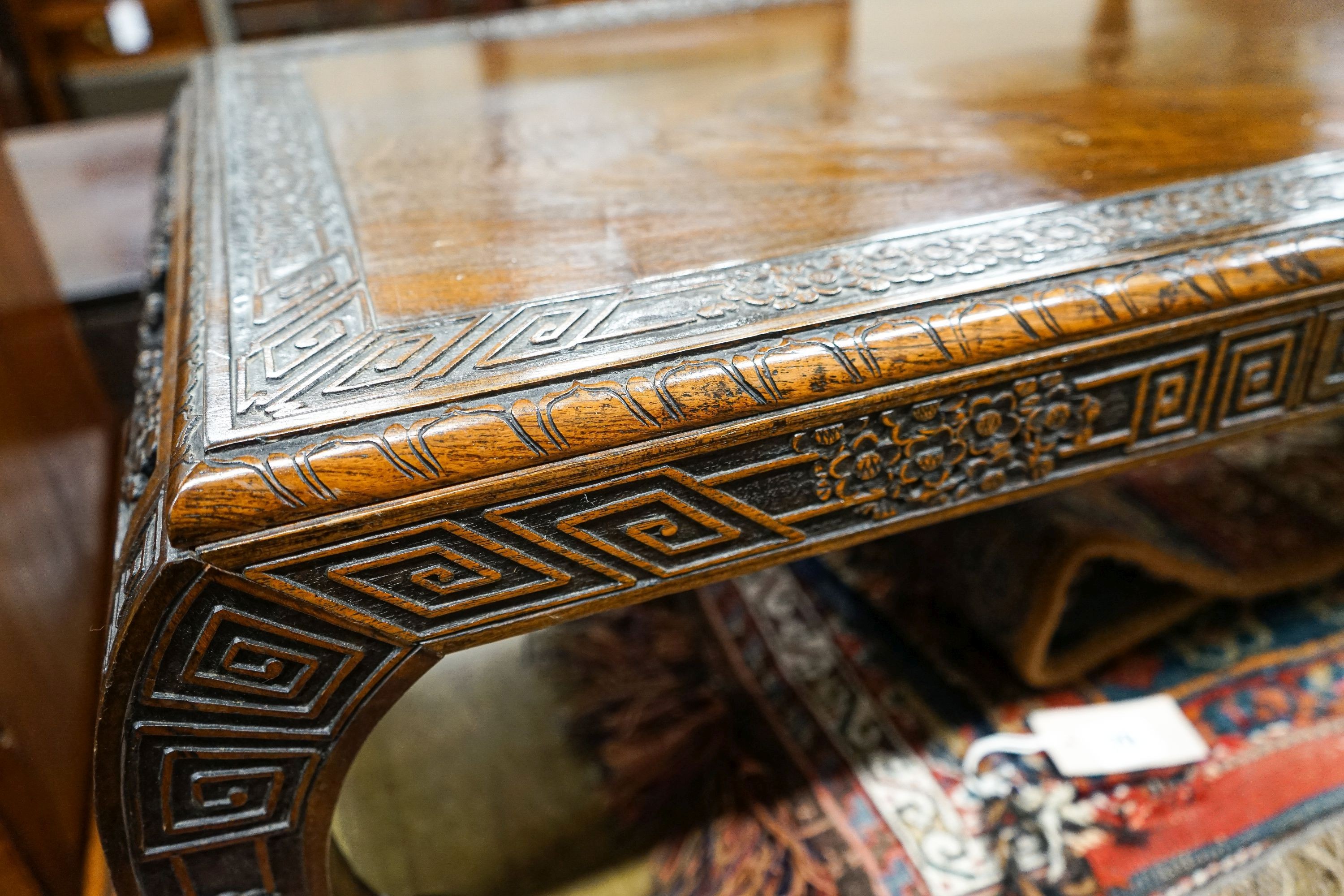 A Chinese rectangular carved top hardwood table, width 104cm, depth 46cm, height 29cm